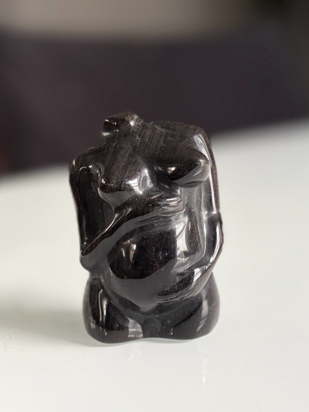 Silver sheen obsidian pregnant goddess carving